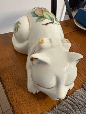White Ceramic Cat Figurine with Hand-Painted Peach Motif and Gold Trim
